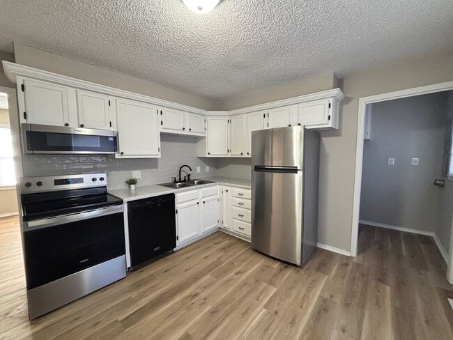 Photo - Newly Remodeled 3 Bedroom Home with Fenced Yard!