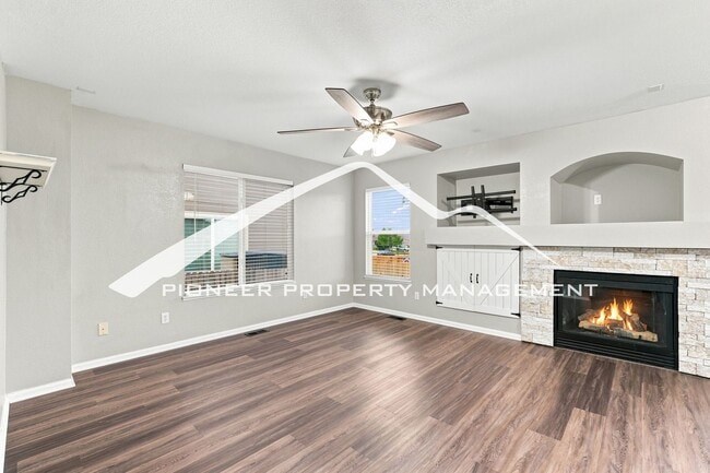 Photo - Spacious 4-Bedroom Home with a Finished Basement, 2 car garage, EV Charger and Low Maintenance, E...
