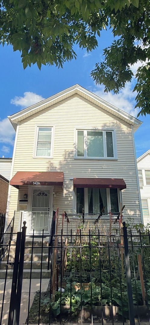Building Photo - 3429 S Wallace St Unit 2