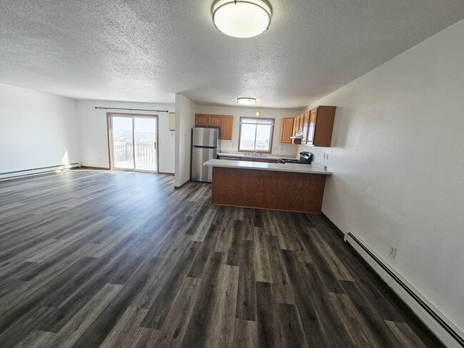 Photo - Fully Remodeled 1,250 Sq Ft 2 Bedroom Apartment with Garage, In-Unit Laundry & Private Balcony – ...