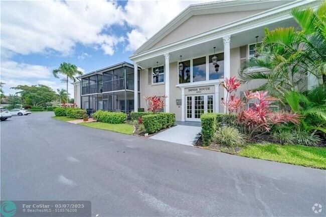 Building Photo - 9000 Jacaranda Ln Unit 206 Rental