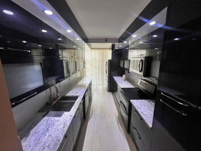 Photo - 19707 Turnberry Way Unit 8L