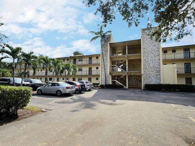 Building Photo - 9150 NW 38th Dr Unit 306
