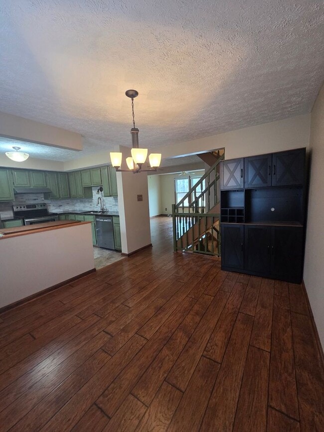 Building Photo - Serene Living in a Quiet Lakeside Community