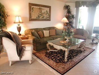 Building Photo - 7117 Pelican Bay Blvd Unit 1202 Rental