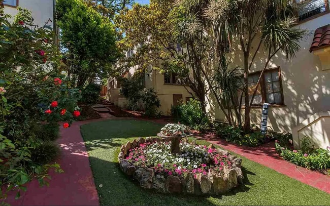 Photo - Beautiful Spanish townhouse with parking and in unit laundry!