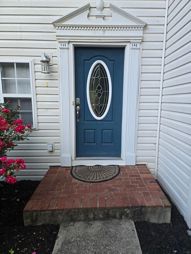 Photo - Spacious 2-Bedroom Townhome – End Unit with Private Deck & Garage