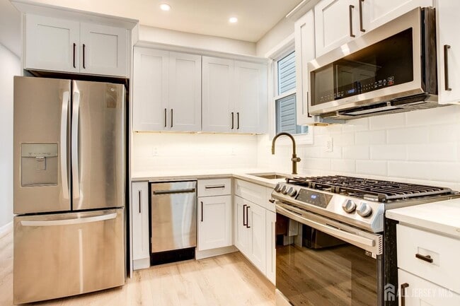 Photo - 3436-36 Millington Ave Unit 1