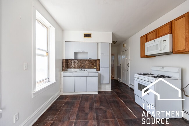 Building Photo - 2652 W 23rd Pl Unit 2F