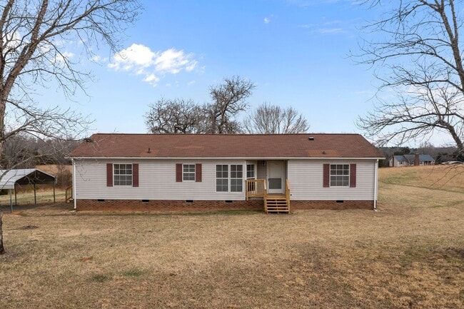 Building Photo - Charming 4-Bedroom Home on Spacious 2.64-Acre Lot in Graham, NC