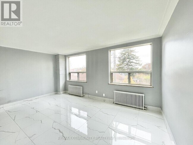 Photo - 2624 Eglinton Ave E Unit 2