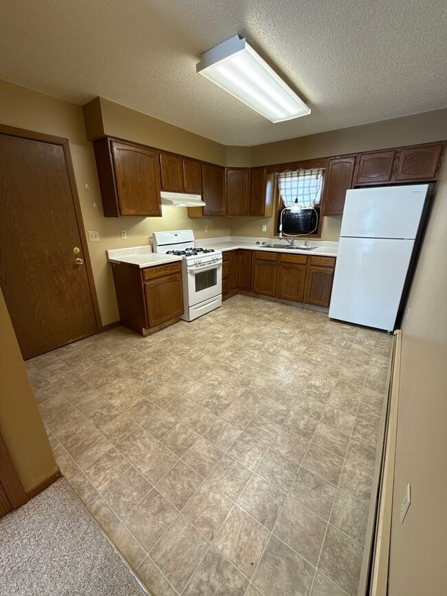 Building Photo - 1513 3rd Ave NW Unit 1