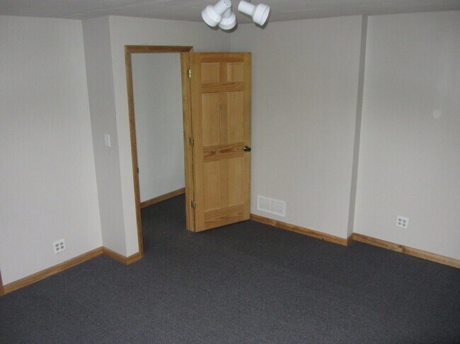 Photo - 3 bedroom house available June 1st! Lots of privacy with 1 room on each floor. Has central air.