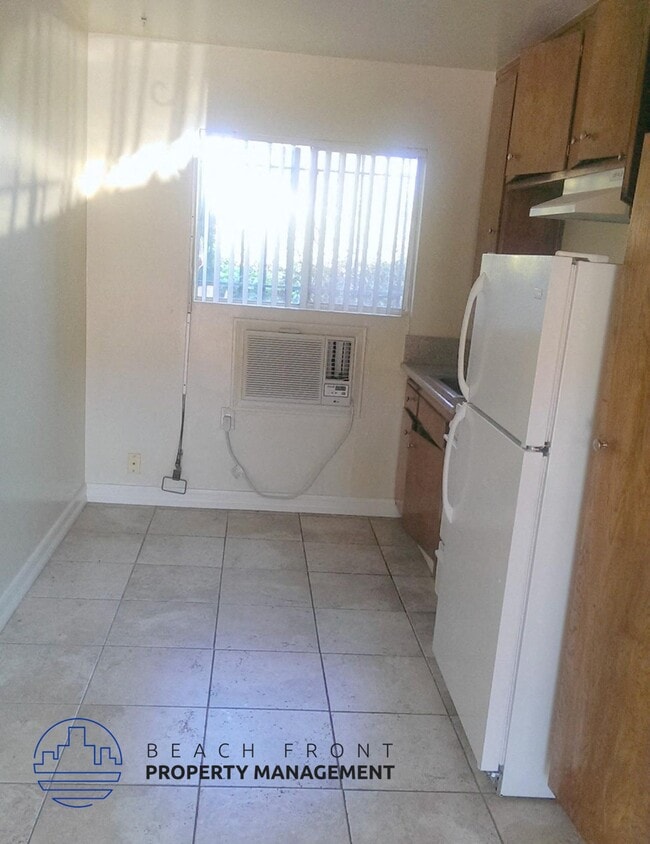 13921 Normandie Ave.