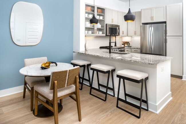 Luxury vinyl plank flooring in renovated kitchens, bathrooms, and living/dining areas