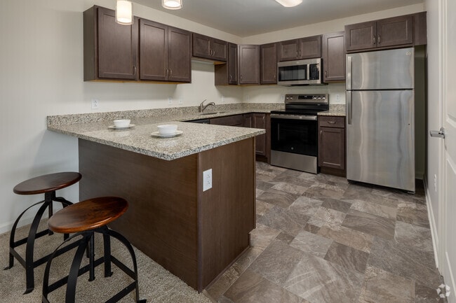 2BR, 1BA - 825SF - Kitchen, Dining Room - Fox Run Senior Apartments