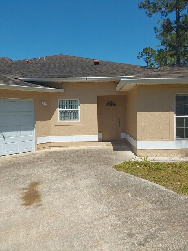 Photo - Great 3/2/1 duplex with a private driveway...