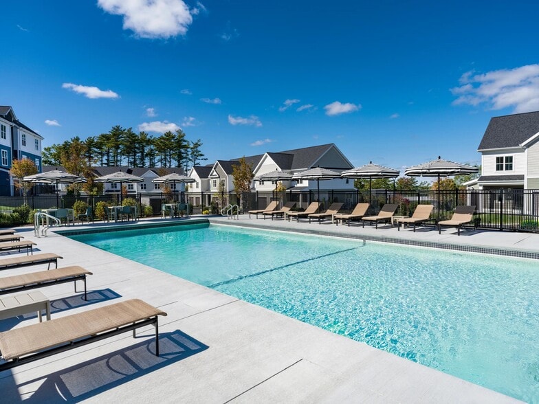 Take a dip or lounge poolside—this expansive outdoor pool offers plenty of space to unwind under the sun.