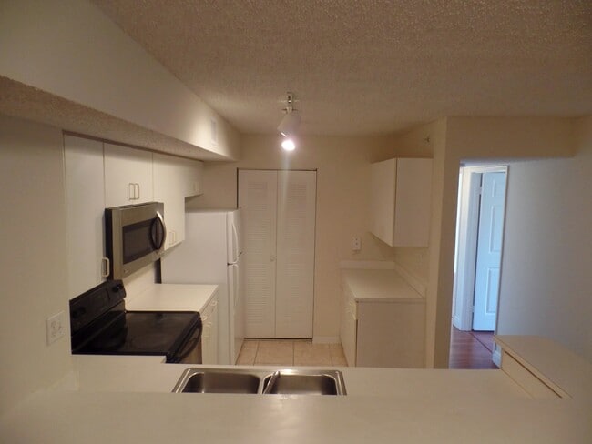 Building Photo - 3844 Lyons Rd Unit 211