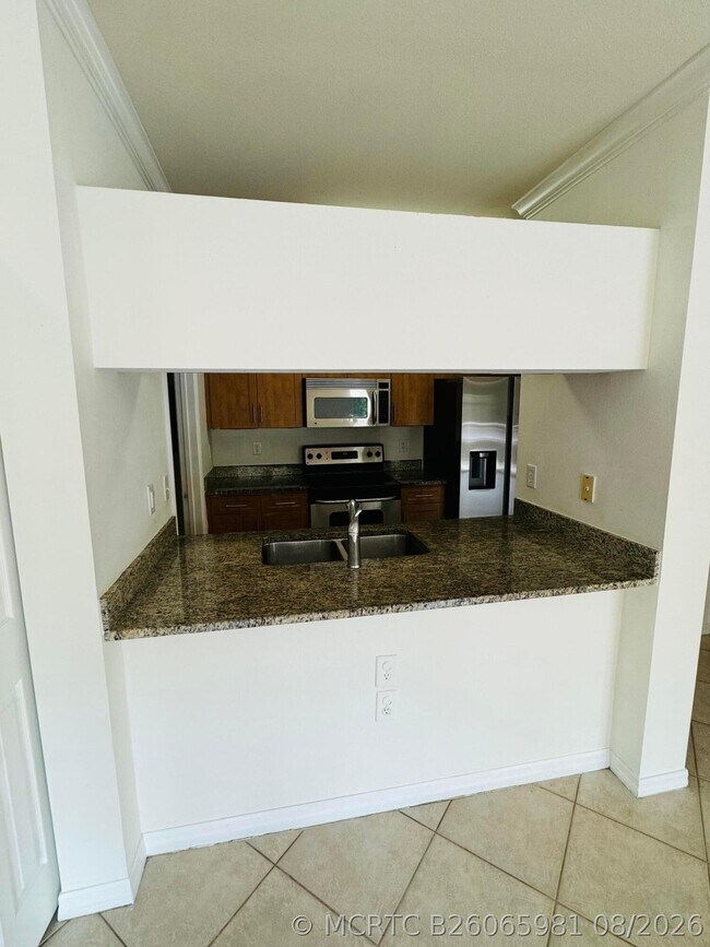 6394 Emerald Dunes Dr Unidad 202