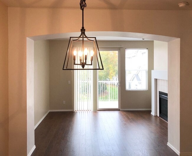 Main living area with gas fireplace. - 6123 S 232nd St