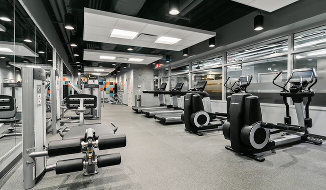 Fitness center features Fitness on Demand virtual fitness classes, cardio machines with personal TVs and resistance machines