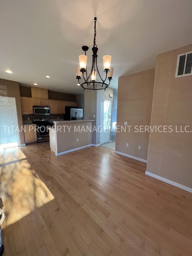 Photo - Beautiful Three Story Townhouse with Gas Fireplace, Balcony & 2-Car Garage Unit 101