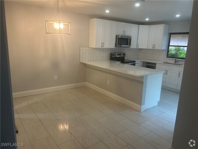 Building Photo - 18001 San Juan Ct SE Unit 4 Rental