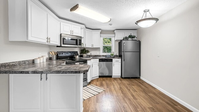 Our kitchens offer timeless white cabinetry and gleaming stainless steel appliances, which exude modern functionality with classic charm. - The Willows