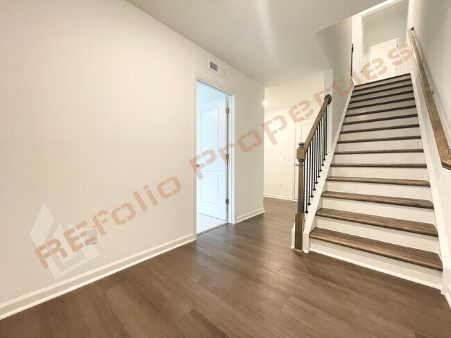 Photo - Brand New 3 Story, 4 bedroom, 3.5 bathroom Townhome Featuring a 1st floor Guest Suite, 2 Car Gara...