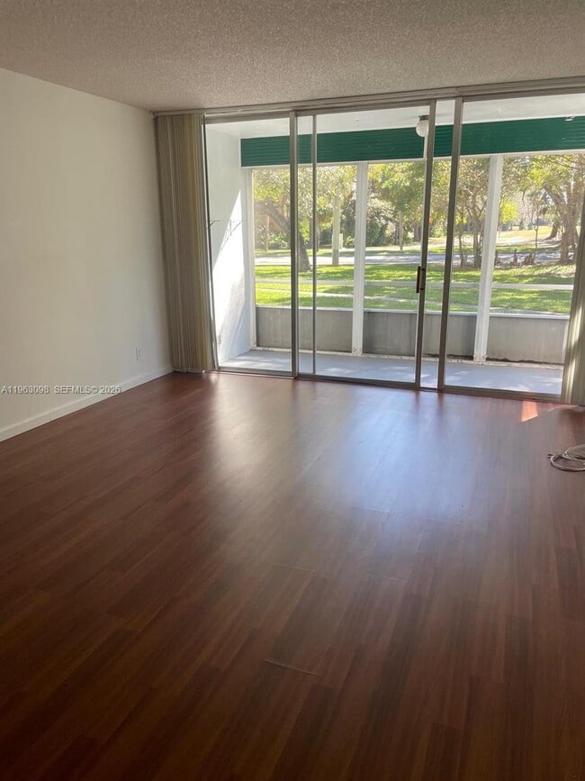 Building Photo - 8300 Sands Point Blvd Unit K105