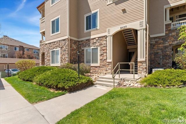Building Photo - 8427 S Hoyt Way Unit 201 Rental