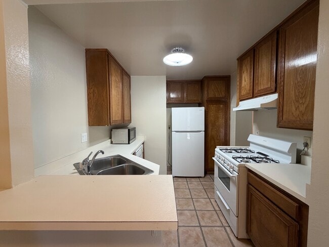 Spacious 2-Bedroom Condo in Prime Santa Clara Location - 2 Car parking spots included, in-unit la...