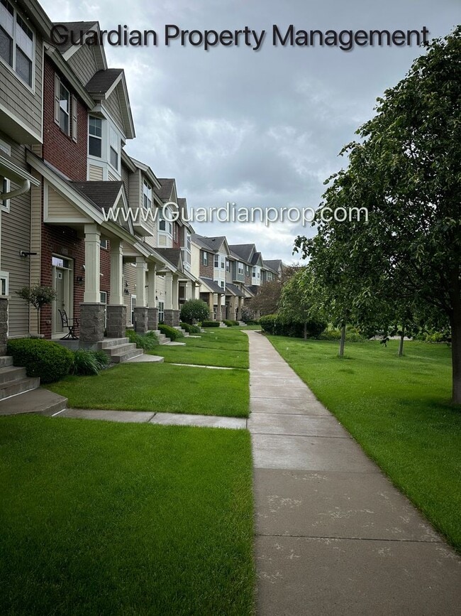 Photo - Pet Free Champlin Town Home, 3.5 Baths, 2 Car Garage, Dishwasher, Balcony, Available end of April