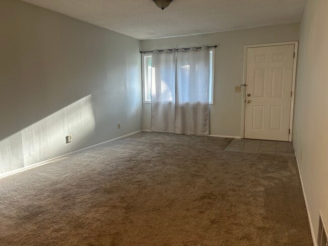 Building Photo - 10923 Dahlia St NW Unit 10923