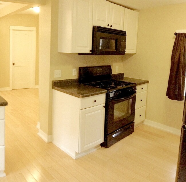 Photo - Spacious 4-Bedroom Retreat with Elegant Hardwood Floors in Minneapolis