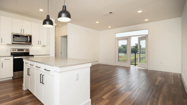 Living Room with Balcony and Hard Surface Flooring