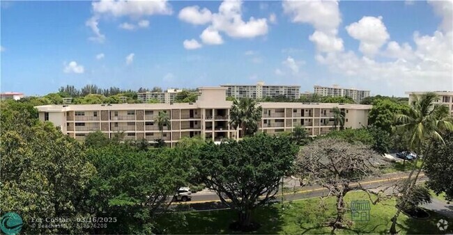 Building Photo - 2850 N Palm Aire Dr Unit 504 Rental