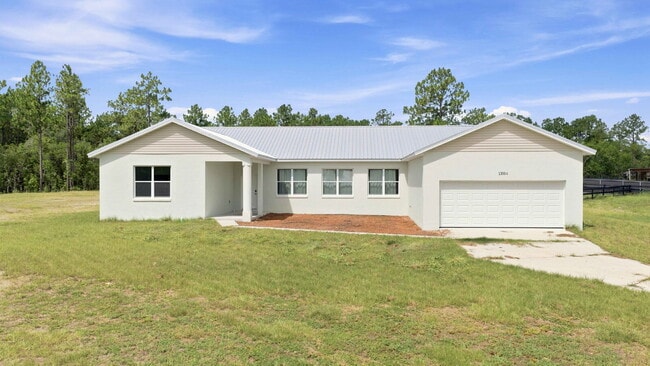 Building Photo - Country Living with Modern Convenience!