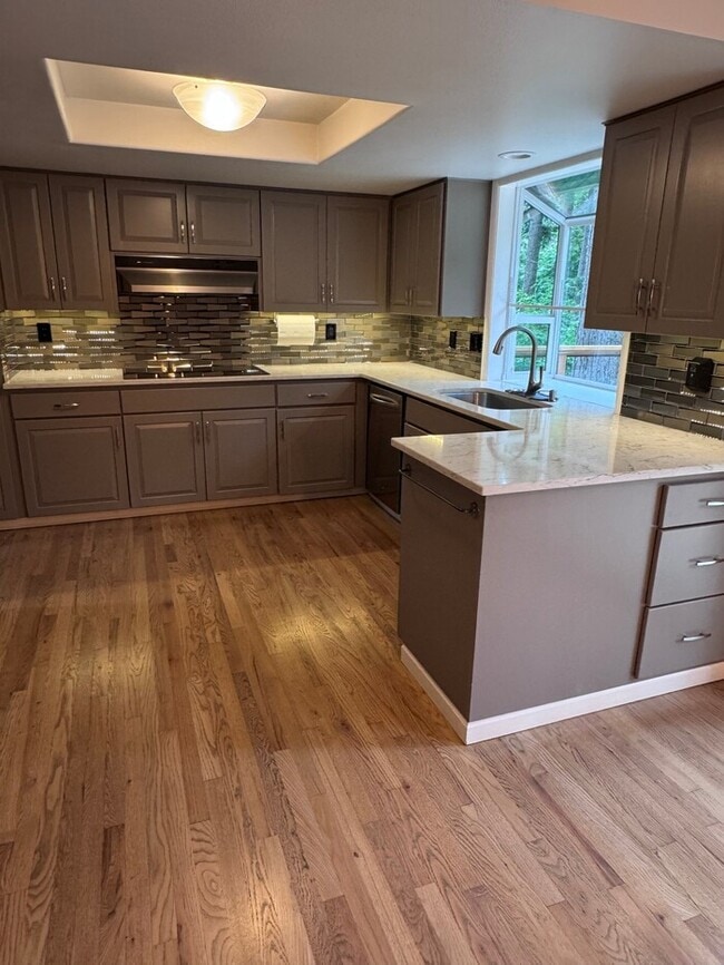 Photo - Spacious 4 Bed Home Backing to Private Woodland Trails! Finished Basement, Large Deck, Office, Pe...