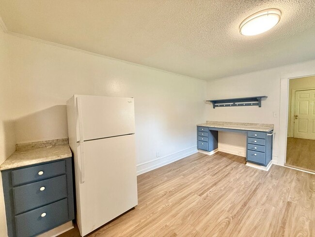 Photo - **OFFERING WAIVED APPLICATION FEES & $100 MOVE IN PROMOTION** Charming 3BD, 1BA Garner Condo Near... Unit 108 W Garner Road