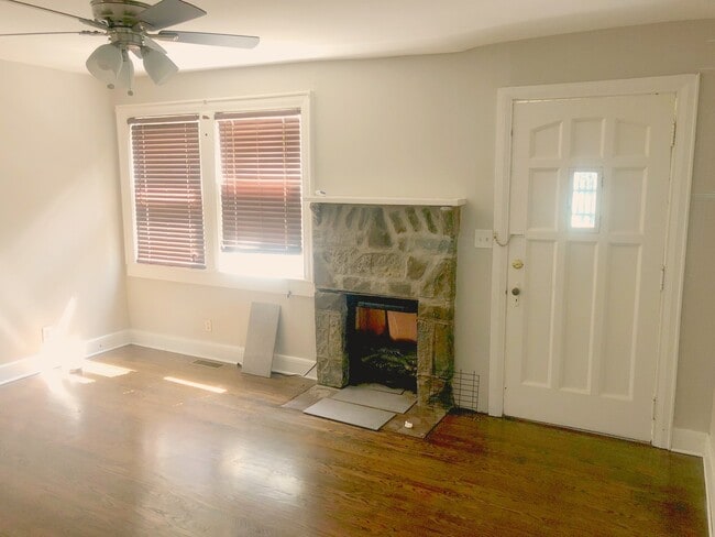 Charming living room with vintage stone fireplace