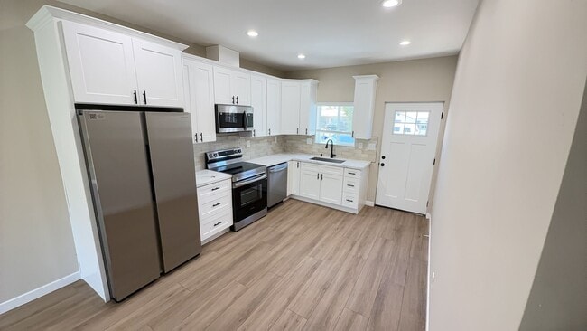 Photo - Built In 2024 - 4 bed 2 bath House (Lease out, pending signatures. Check back in a few days!)