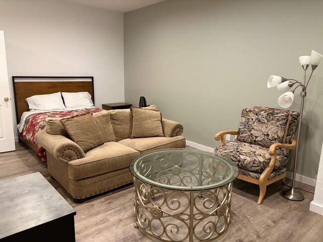 Same bed, loveseat couch, large comfy chair, coffee table - 136 Farallon Dr Unit Garden Studio