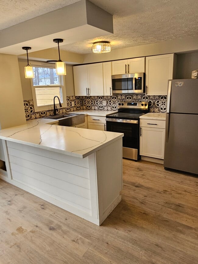 Photo - 455 Cobblestone Ave NE Unit 455