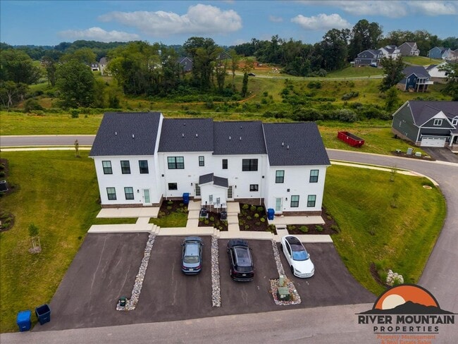Photo - Well-Located Townhome with Private Off-Street Parking
