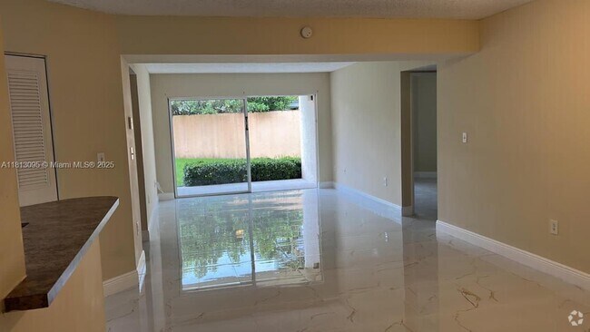 Building Photo - 6284 NW 186th St Unit 106 Rental