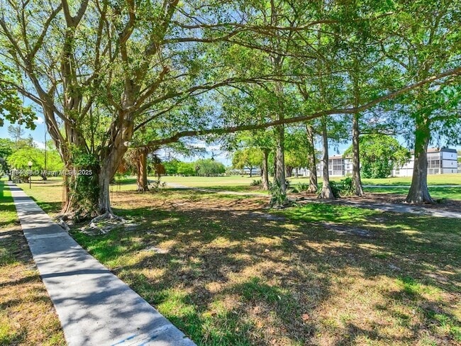 Building Photo - 8401 Lagos De Campo Blvd Unit V210