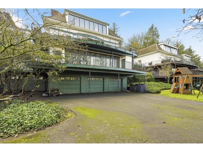 Building Photo - One-of-a-Kind 5BR Home with Floor-to-Ceiling Windows, Wraparound Decks & Breathtaking Treeline Views