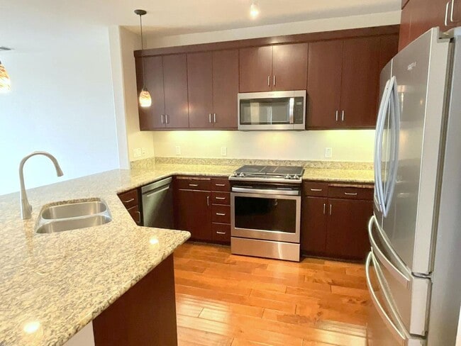 Photo - Great Corner Condo ! Lots Of Light ! Elan ... Unit #319